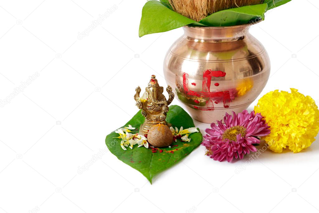 kalash pujan ganesha pujan Indian festival akshaya tritiya Decorative kalash with coconut and leaf with floral decoration