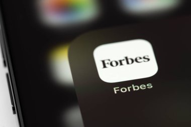 Forbes mobile icon app on screen smartphone iPhone macro. Forbes is an American family-controlled business magazine. Moscow, Russia - July 20, 2021
