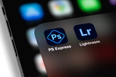 Adobe Photoshop and Lightroom icon apps on screen smartphone iPhone. Adobe Systems Incorporated is an American multinational computer software company. Moscow, Russia - August 10, 2021