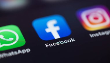 Facebook, WhatsApp, Instagram - mobile icons app on screen smartphone iPhone macro. Facebook is largest and most popular social networking site in the world. Moscow, Russia - July 28, 2021