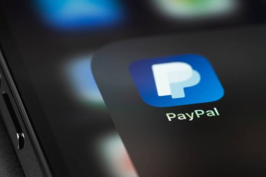 PayPal mobile icon app on screen smartphone iPhone macro closeup. Paypal is an internet based digital money transfer service. Moscow, Russia - July 27, 2021