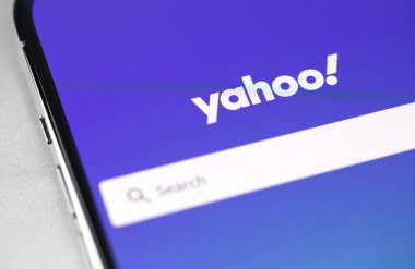 Yahoo Search mobile app on screen smartphone iPhone closeup, Yahoo start page.  Yahoo is tech company, leader in search engine service and information technology web portals. Moscow, Russia - July 28, 2021