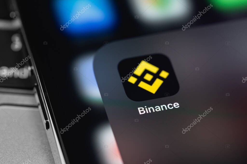 Binance icon mobile app on screen smartphone iPhone closeup. Binance - one of the largest cryptocurrency exchange on the market. Moscow, Russia -  July 27, 2021