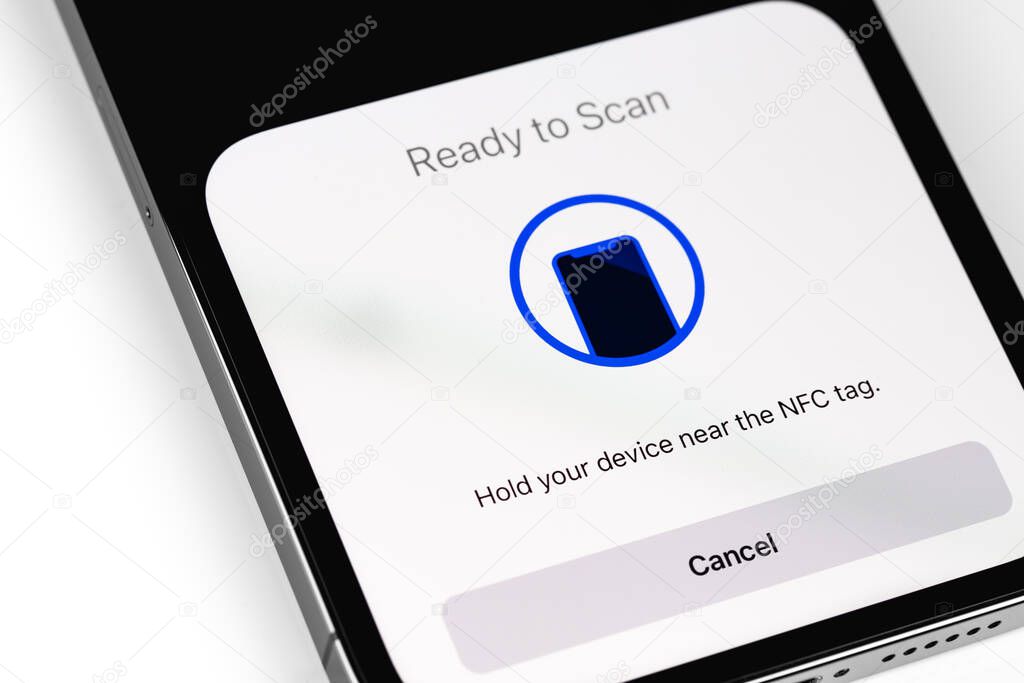 NFC scanner on screen smartphone iPhone. Apple is a multinational technology company. Moscow, Russia -  July 17, 2021
