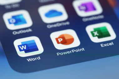 Microsoft services - Microsoft Word, Powerpoint, Excel mobile apps on screen smartphone iPhone closeup. Microsoft Corporation is an American multinational technology company. Moscow, Russia - August 15, 2021