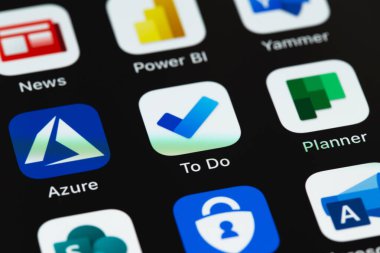 Microsoft services (To Do, Azure, Planner, Yammer, News and other mobile apps on screen smartphone iPhone closeup. Microsoft Corporation is an American multinational technology company. Moscow, Russia - August 10, 2021