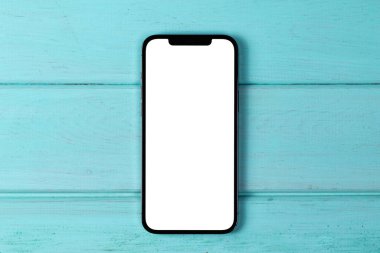mockup smartphone iPhone with white screen, empty display on a colored background. Apple is a multinational technology company. Moscow, Russia - September 25, 2021