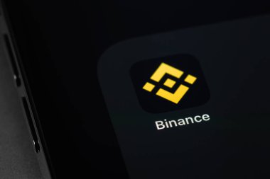 Binance mobile app on screen smartphone. Binance - one of the largest cryptocurrency exchange on the market. Moscow, Russia - October 14, 2021