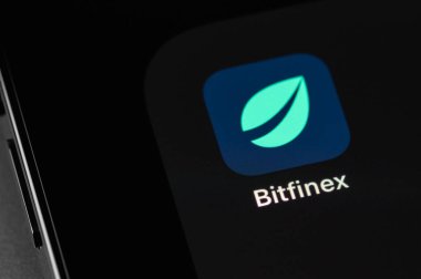 Bitfinex mobile app on screen smartphone. Bitfinex is cryptocurrency exchange on the market. Moscow, Russia - October 14, 2021