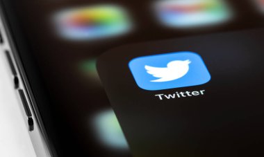 Twitter mobile icon app on screen smartphone iPhone closeup macro. Twitter is a social media online service for microblogging and networking communication. Moscow, Russia - September 22, 2021