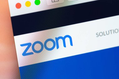 Zoom logo website on display notebook closeup, macro. Zoom Video Communications is a company that provides remote conferencing services. Moscow, Russia - October 17, 2021