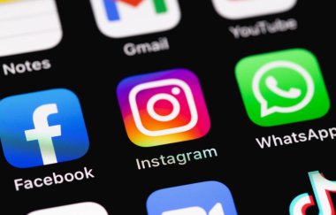 Facebook, Instagram, WhatsApp - social media app icons, messengers on screen smartphone iPhone closeup. Moscow, Russia - August 10, 2021