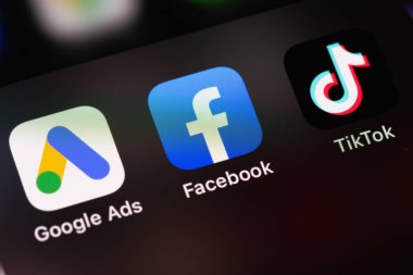 Google Ads, Facebook, TikTok mobile icon apps on screen smartphone iPhone macro. Social media marketing (SMM). Moscow, Russia - October 17, 2021