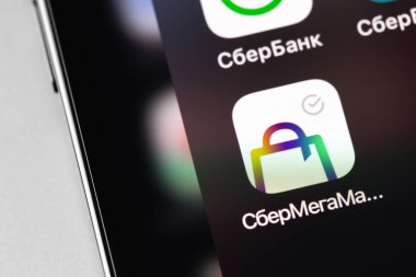 SberMarket or SberMegaMarket icon app on screen smartphone. SberMarket - Russian online service for the delivery of groceries and goods (Sberbank ecosystem). Moscow, Russia - October 14, 2021