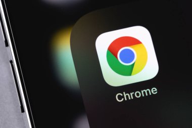 Google Chrome browser mobile icon app on screen smartphone iPhone closeup. Google Chrome is a browser developed by Google. Moscow, Russia - January 17, 2022