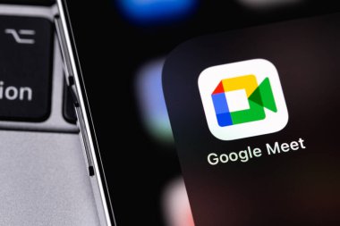 Google Meet icon mobile app on screen smartphone iPhone closeup. Google Meet is a video calling service developed by Google. Moscow, Russia - January 17, 2022