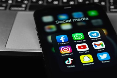 Facebook, WhatsApp, Telegram, Instagram, YouTube, Gmail, TikTok, Snapchat, Twitter - showing social media apps on screen smartphone iPhone. Batumi, Georgia - March 3, 2022