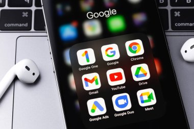 Google services (Google One, Gmail, Chrome, Duo, Meet, Drive, Meet, Duo, Ads) icons apps on screen smartphone iPhone. Google is the biggest Internet search engine in the world. Batumi, Georgia - March 4, 2022