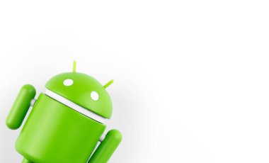 Google Android figure on white background, closeup. Google Android is the operating system for smartphones, tablet computers, e-books and other devices. Batumi, Georgia - May 13, 2022