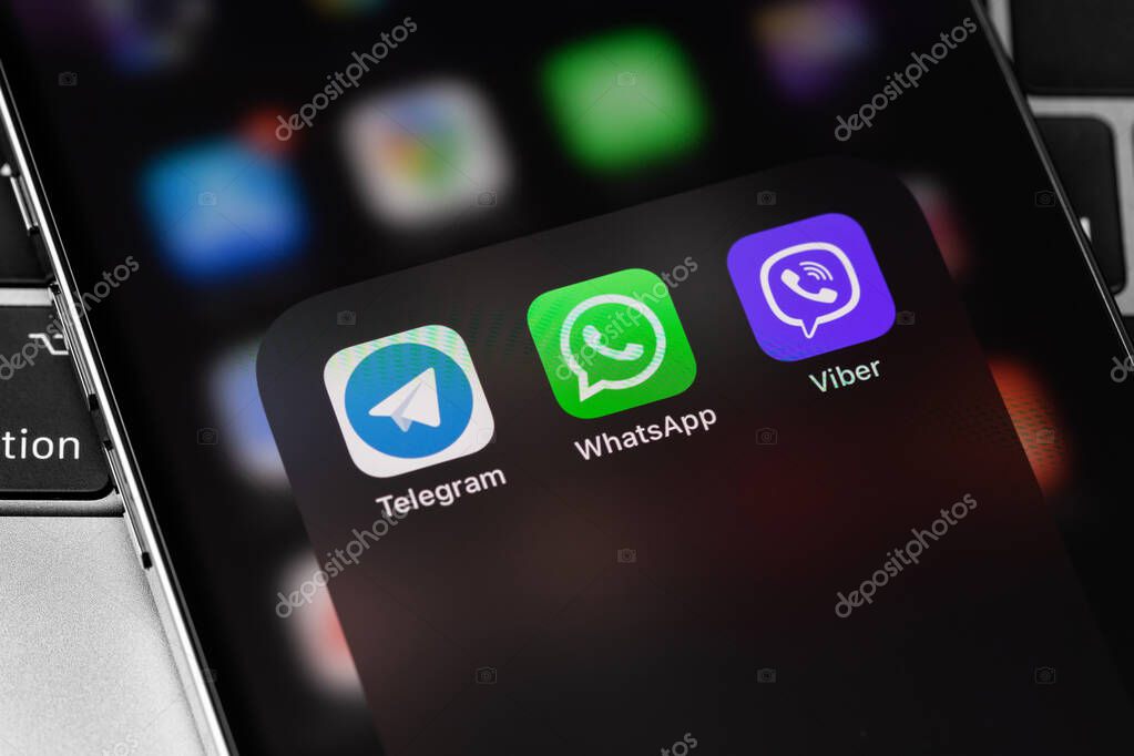 Telegram, WhatsApp, Viber -  free messenger apps on screen smartphone iPhone closeup. Batumi, Georgia - March 2, 2022