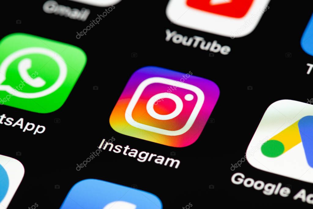 Showing social media mobile apps icons of Instagram, WhatsApp, Youtube on screen smartphone, interface iPhone. Batumi, Georgia - May 7, 2022
