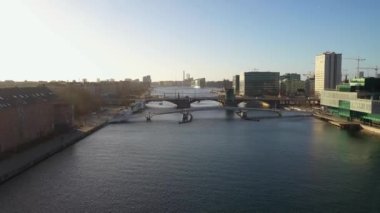 Copenhagen, Denmark - January 14, 2022: Aerial drone view of the new modern pedestrian and cycling bridge Lille Langebro.