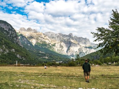 Unrecognizable people enjoy in the Theth valley