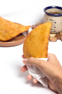Fritish empanada stuffed with meat. Traditional food in Venezuela and Colombia