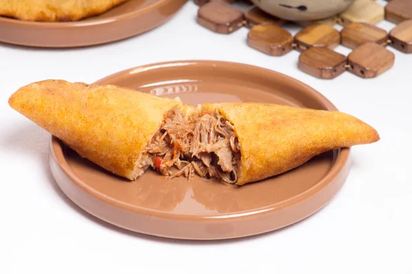 Fritish empanada stuffed with meat. Traditional food in Venezuela and Colombia
