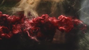 Mürekkepli su izi logosu kırmızı parıltılı toz bulutu gösteriyor