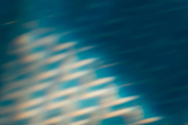 Borrão brilho fundo luz flare azul laranja raios — Fotografia de Stock