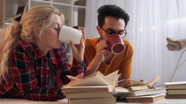 Enjoying study inspired couple exam preparation — стоковое видео