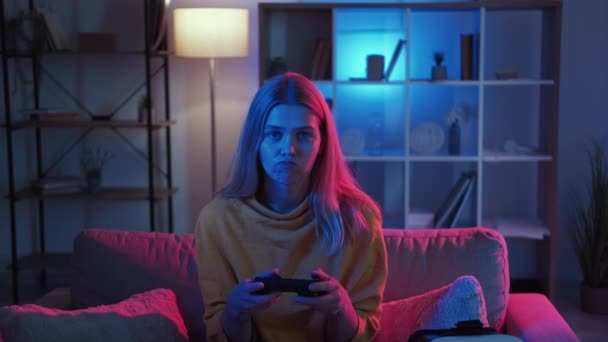 Boring evening female gamer cyber entertainment — Stockvideo