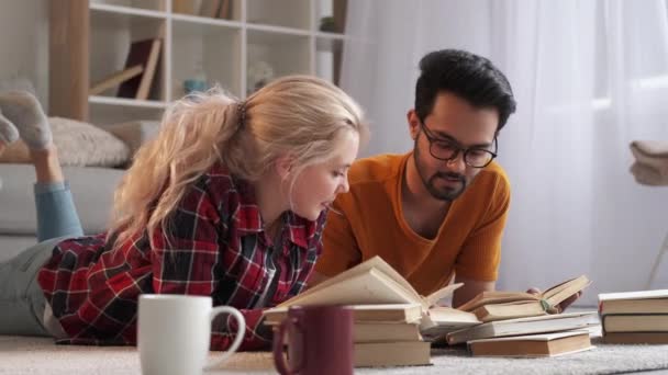 Study together diverse couple homework education — Vídeo de Stock