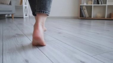 tiptoe walk female feet home silence barefoot