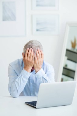 work stress overwork depression upset man office