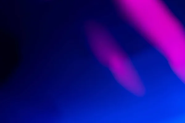 Neon light overlay defocused glow pink blue dark — Stock Photo, Image