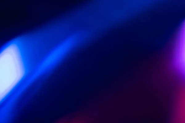 Borrão cor flare neon brilho fundo azul roxo — Fotografia de Stock