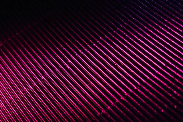 Couleur fond lumineux texture rainurée rose fluo — Photo