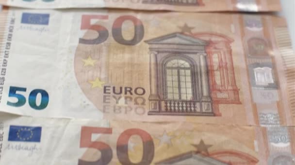 Eurokészpénz háttér 50 bankjegy papír alapú bankjegyek — Stock videók