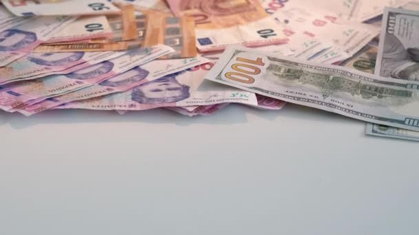 Moneda internacional euro dólar hryvnia dinero — Vídeos de Stock