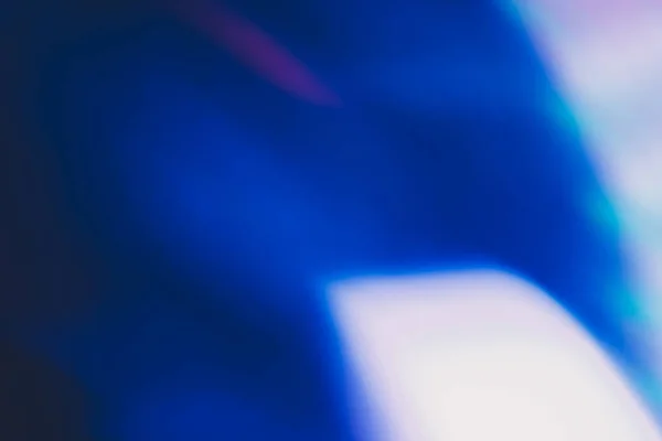 Defokussiert glühen Overlay-Linse Flare blau weißes Licht — Stockfoto