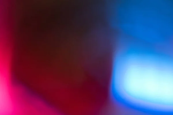 Elmosódott szín flare neon ragyogás háttér rózsaszín kék — Stock Fotó
