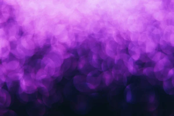 Onscherpe kleur achtergrond bokeh licht neon paars — Stockfoto