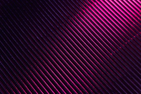 Гофрована текстура неонове світле тло рожеве сяйво — стокове фото