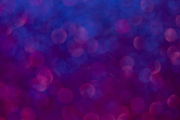 Neón bokeh brillo desenfoque luz fondo azul púrpura — Foto de Stock