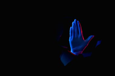 Doktor uyarısı. El hareketi siyah yırtık duvar.