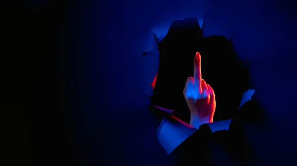 Fuck you neon hand middle finger obscene sign dark — Fotografia de Stock