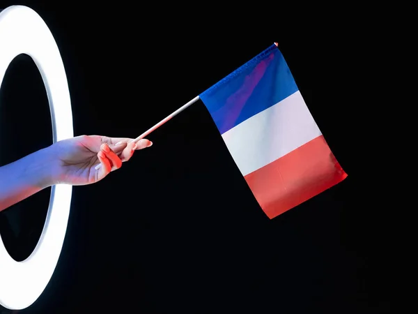 Bandera de Francia símbolo patriótico mano tricolor negro —  Fotos de Stock