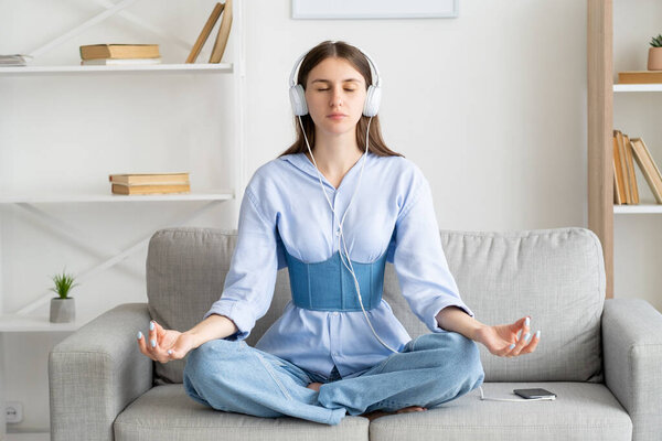 enjoying music meditating woman sound relaxation